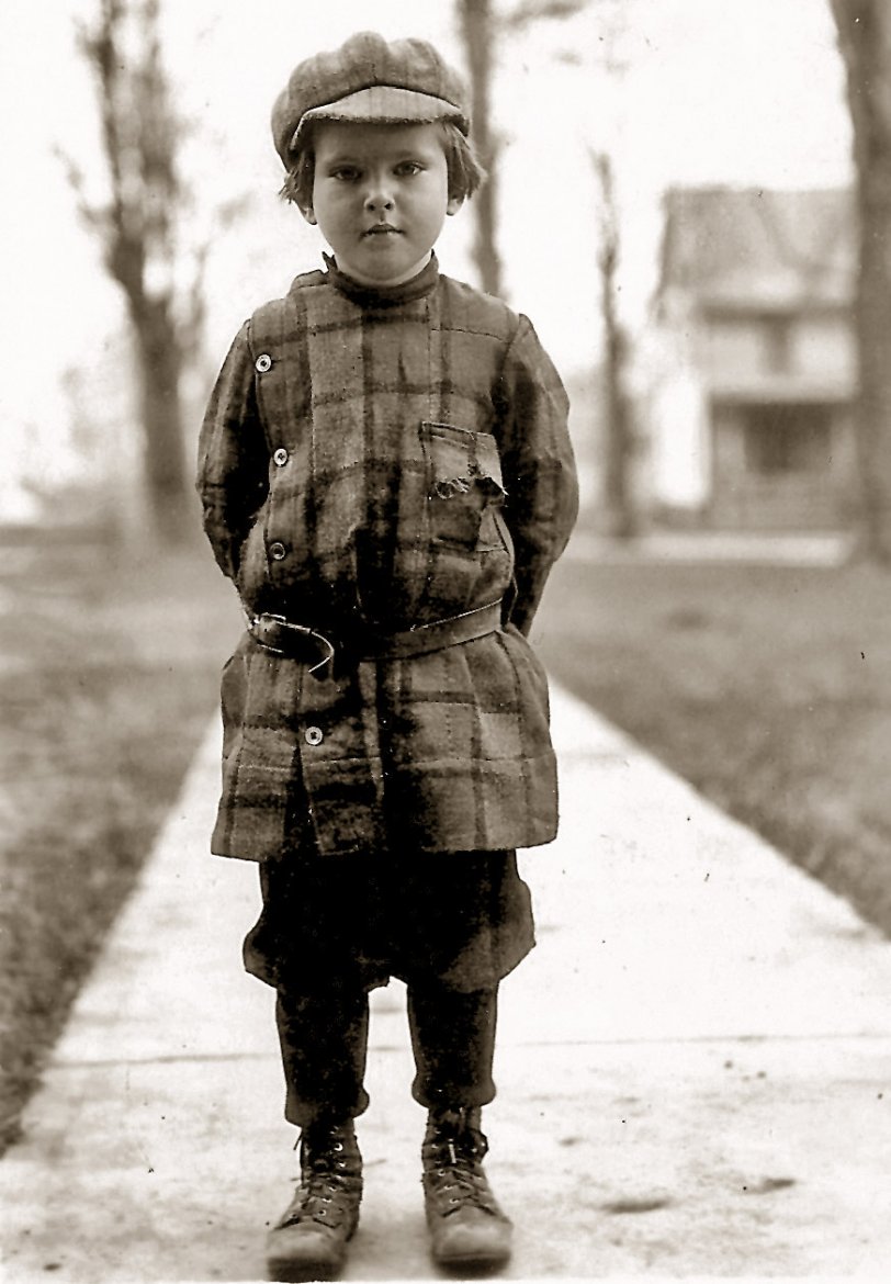 My grandfather Edward Blankman in front of his house in Canton, New York, about 1913. View full size.
