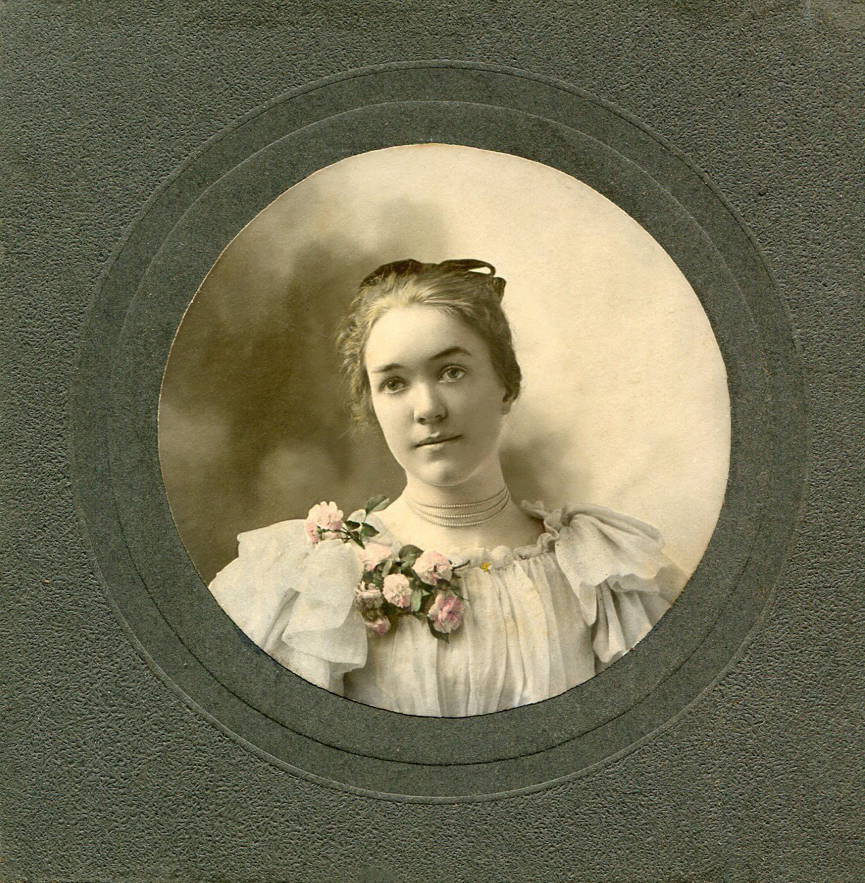 This is a distant cousin, Miss Emma Scott (1883, Iowa - 1970). She was the daughter of Lauren A. Scott and Fannie Childs, wife of Orland Harrison Bailey. View full size.