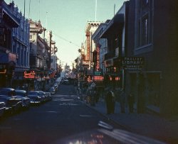 I don't know too much about this slide, except it was taken in the evening in San Francisco's Chinatown, circa 1956. I like the neon signs.  View full size.
Reminds me of Hitchcock&#039;s &quot;Vertigo&quot;Reminds me of the Hitchcock movie, "Vertigo." Remember when Jimmy Stewart follows Kim Novak's Jaguar all around SF? Way hip photo.
All that neonI love it, the sun's going down and all the neon signs are coming on.  I can almost smell the Chinese food cooking in all the restaurants.  
(ShorpyBlog, Member Gallery)