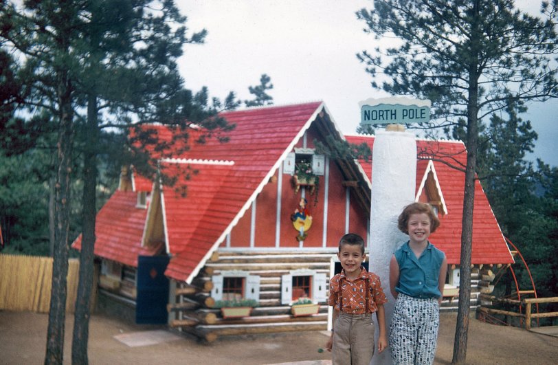 My father and his sister in 1956 at "North Pole Colorado -- Home of Santa's Workshop," at the foot of Pikes Peak. Dad was 6 and his sister 8. View full size.

