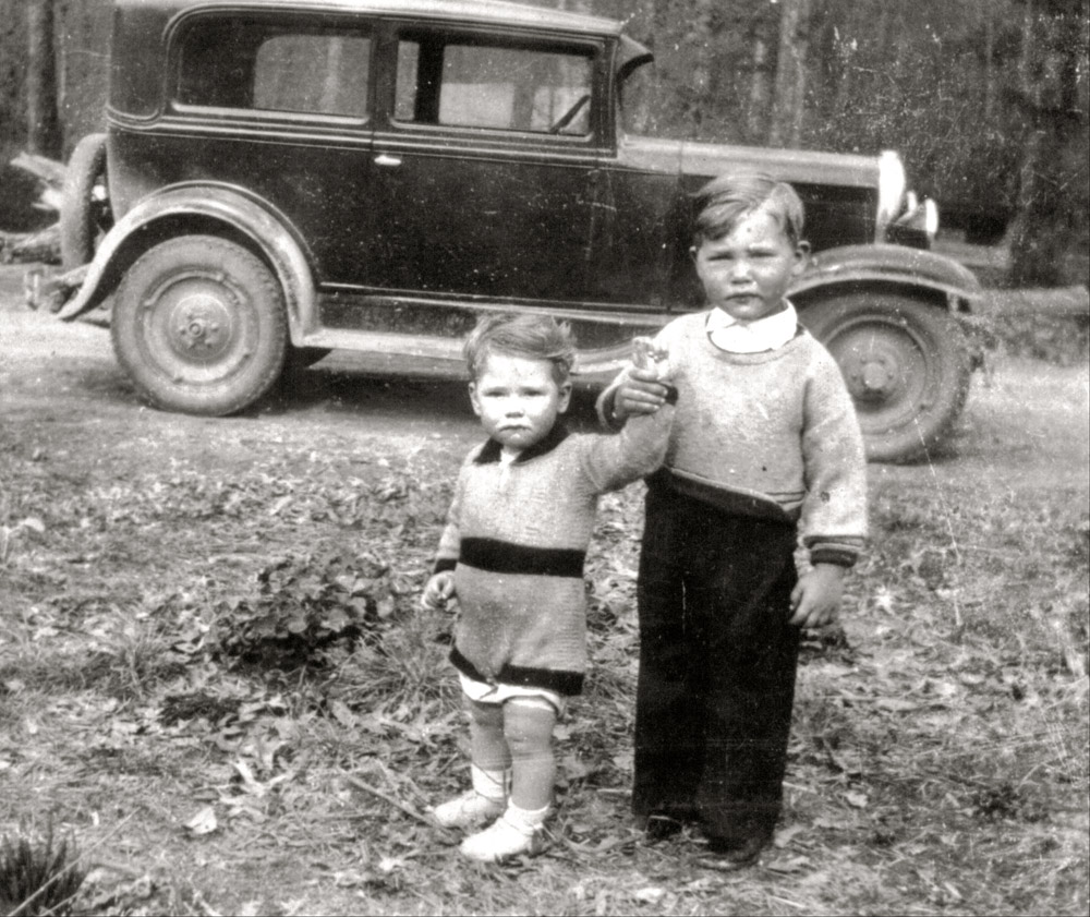My Dad (the little one) and his brother pose in front of a car in 1936.  I just love his little pudgy knees and saggy diaper.  This photo was taken in East Tennessee, probably in Jefferson County (Swansylvania area).
