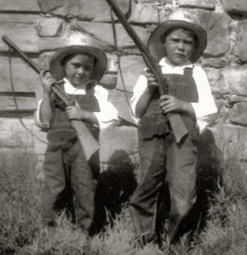 Dad and his brother began hunting at a very early age.  This photo, from 1938, shows two little boys who are very proud of their new guns. Dad was about 3 and his brother about 5. They were, of course, taught how to use these safely!
