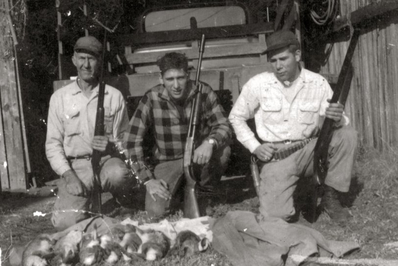 My grandfather, dad, and his brother proudly display dinner -- a common photographic theme from family pics. This photo is probably from around 1950, but we're not certain. My dad, who was born in 1935, still hunts and eats what he nets. I've never been able to join in ... too soft-hearted.
