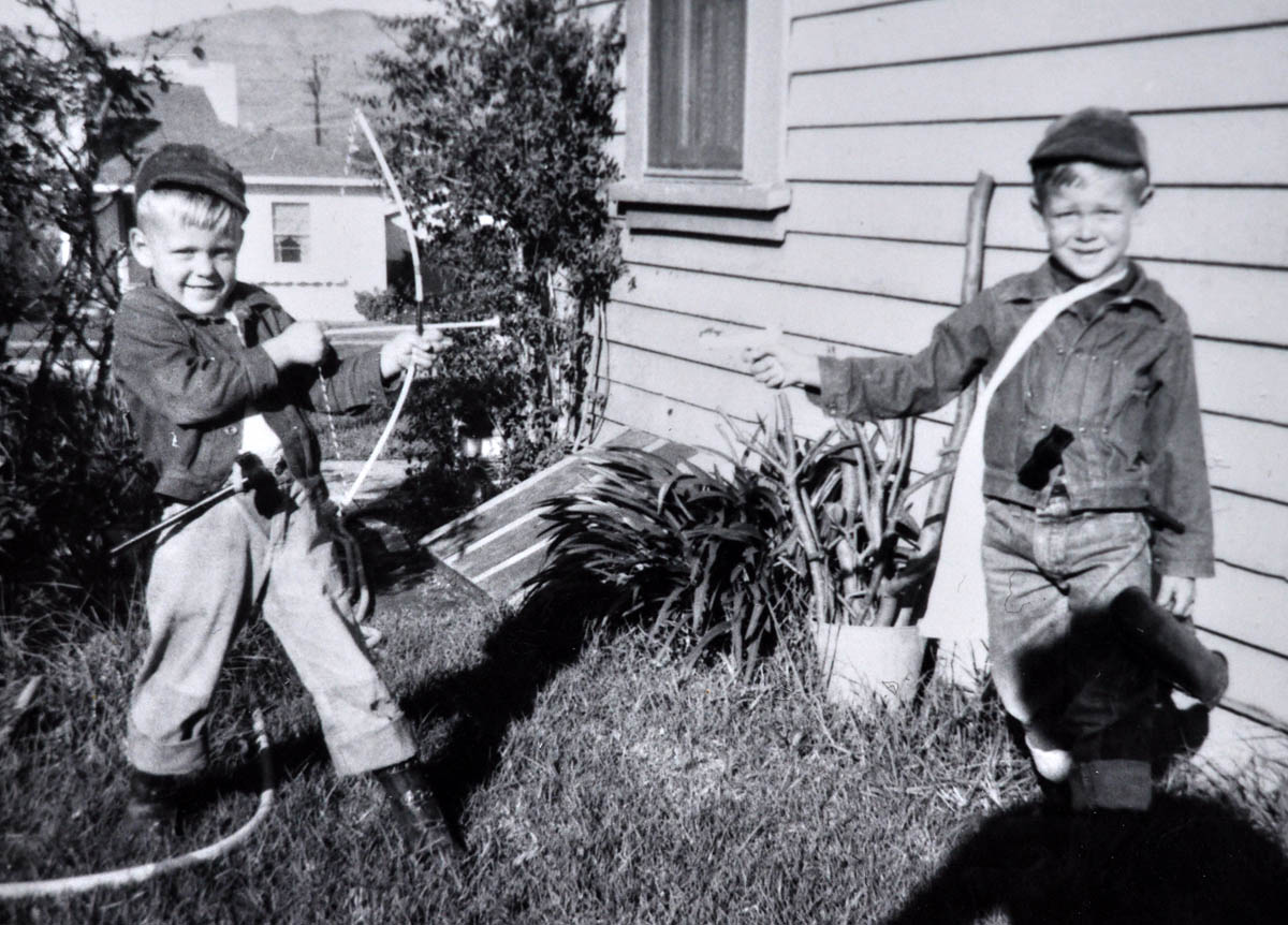 My brother Marty and I (Dave) were the typical American ruffians, never missing an opportunity to try out the latest Christmas present weapons. Growing up in Paso Robles, CA, this photo was taken in San Luis Obispo, CA at our grandmother's. Circa 1956.