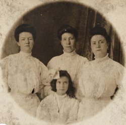 At left is my Great Grandmother, Aunt Kathryn is center and Aunt Margaret is at right. The girl is Sadie, my Great Grandmother's daughter from her first marriage. My great Grandmother was an actress in New York City. She died during childbirth when my Uncle Thomas was born. My Grandfather and Uncle Thomas were raised by their Aunts, three of whom never married. Sadie moved to upstate New York with my Great Grandmother's family. They kept in touch throughout their lives. View full size.
(ShorpyBlog, Member Gallery)