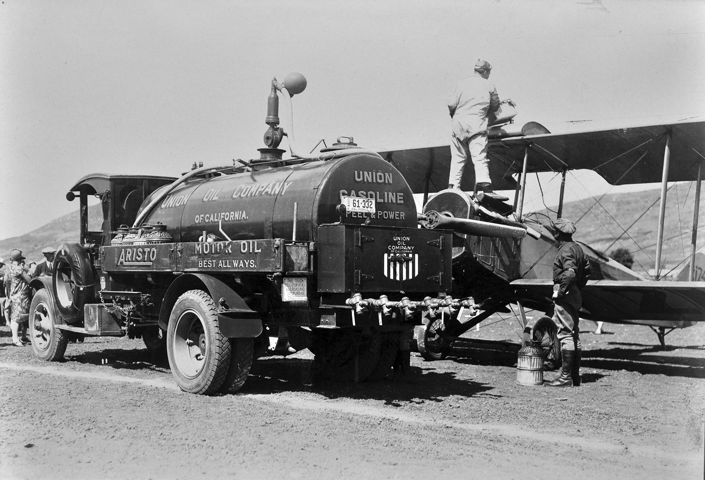 My grandfather, W.W. Skinner, delivered oil and gas for Union Oil in the San Luis Obispo, CA, area. This circa 1940s photo shows him waiting for a fill up at the local airport. 