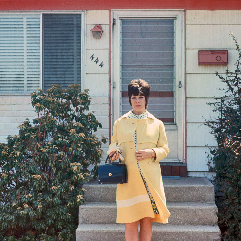 My mother standing in front of our house in Massapequa, Long Island, in 1971. In six months I would be born. View full size.