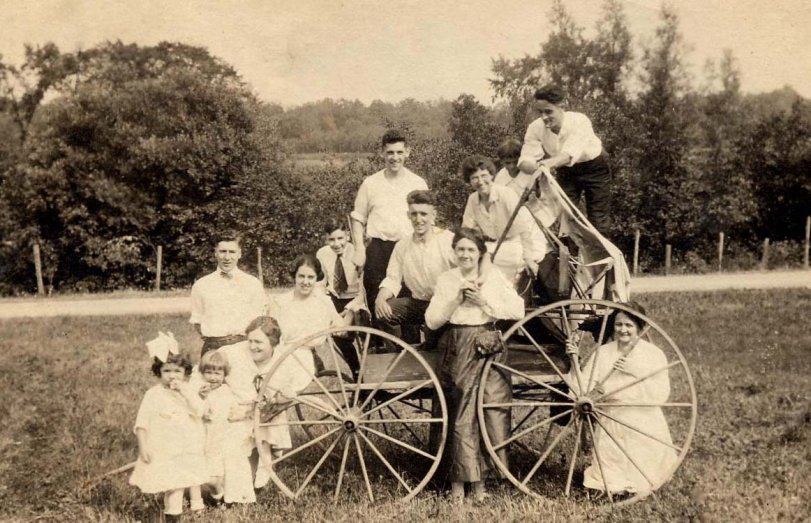 Circa 1917, near Watervliet NY, two of my wife's aunts, (the two little girls on the left) with their mother and other family members, having fun the way they did it back in the day. View full size.
