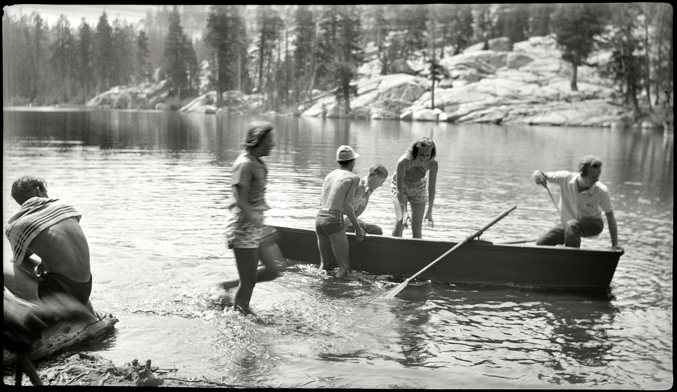 I'd reckon this is the late 1930s in Yosemite. Yosemite seems to be where a lot of these travel pictures were taken. And I can generally judge the age by the kind of negative it is, which is a larger size than the later ones from the '50s and '60s. But tterrace disagrees on the age:

The aspect ratio of the negs is the same as those in our collection from 116 roll film, neg size 2¼ x 4 inches. A popular Kodak Brownie size that could be contact-printed for snapshot-sized prints. Ours date all the way from 1919 up through 1946. Judging by the clothing here, this seems considerably later; 1960s maybe?

What do you think? Scanned from the 4 x 2½ inch negative. View full size.