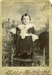 My father circa 1901 taken at a photography studio in Baltimore. Yes, baby boys in the Victorian era did wear dresses. Also, the Victorian age lasted in the US well into the Edwardian age in the UK. View full size.
EvocativeWhenever my Mother got her hands on a baby, she would give their hair that curl on the center of their head; pretty awkward in the 90s. (1990s, that is) Thanks for the memory.  
(ShorpyBlog, Member Gallery)