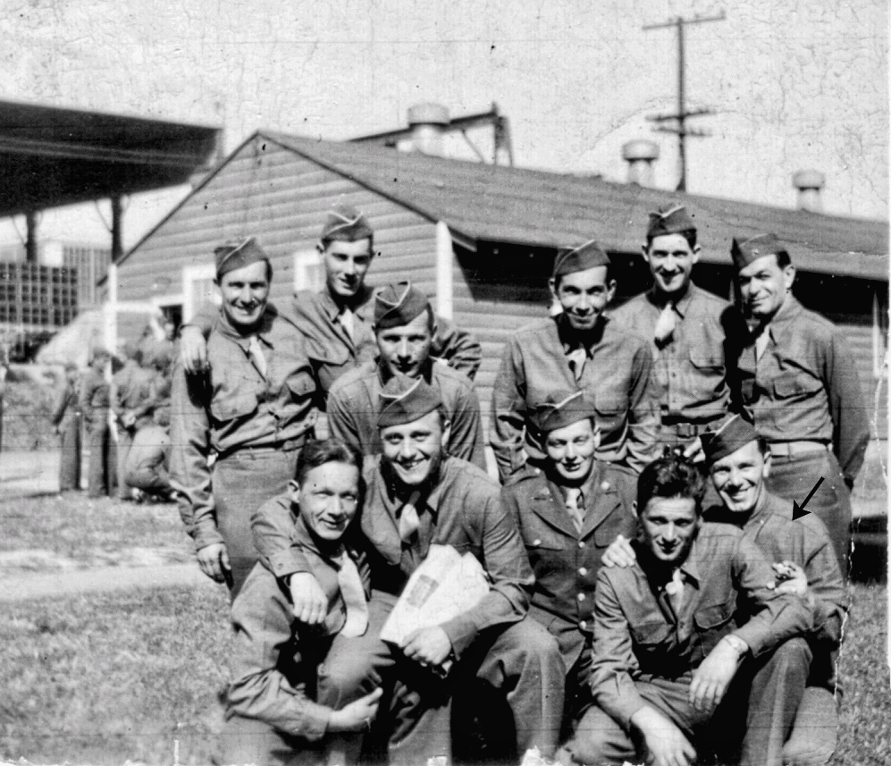 Payday at Fort Holabird in Baltimore County-Dundalk Maryland some time around 1943. Considering the way the men are dressed, I'd guess it was summer. My father (Clarence "Shorty" Hawkins)is front row right (arrow). Fort Holabird is where all the testing was done for the Jeep around 1941. View full size.