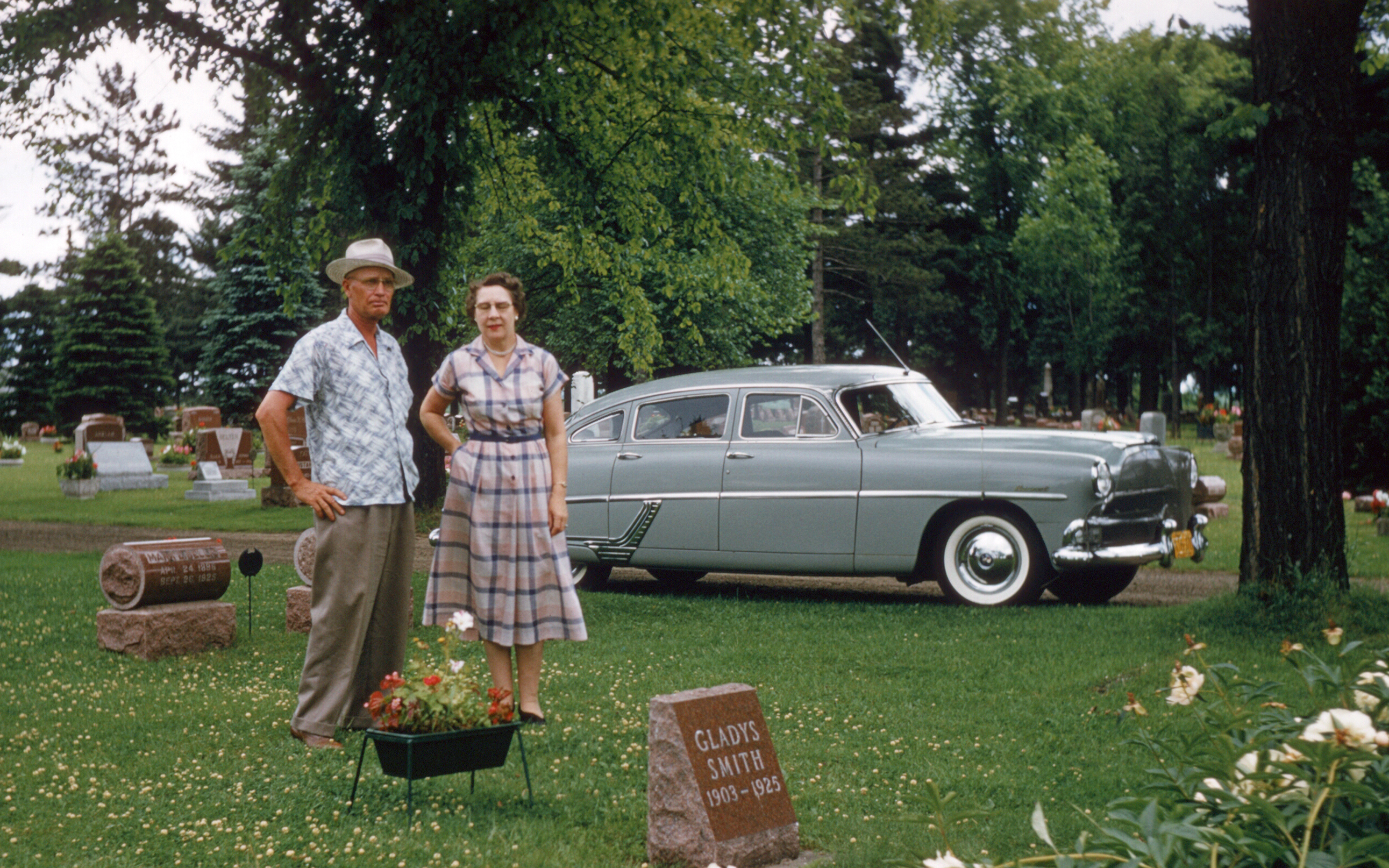 Bert has a new car -- a 1954 Hudson Hornet -- so must take a picture of it while he and Iva visit someone in the cemetery. From my late father-in-law's father's slides. Bert worked for the railroad and loved his cars. They lived in Wausau, Wisconsin, but I'm not sure where this photo was taken. View full size.