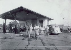 This undated photo shows Foots Whitaker and his crew at a gas station he managed in the North Birmingham community in Alabama. View full size.
(ShorpyBlog, Member Gallery)