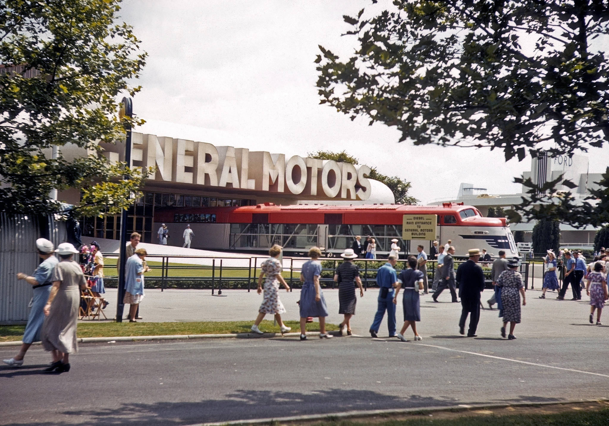 The General Motors Pavilion at the New York World's Fair in 1940. One of a series of Kodachromes taken by my great-grandfather, who was a photofinisher in Washington, D.C. View full size.