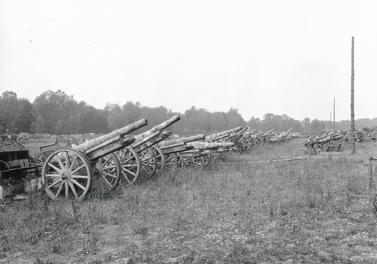 Camouflaged 105mm cannon are in the foreground.  Photo taken by a Captain in the Red Cross in Sedan, France near the Battle of the Ardennes in April 1919.  Scanned from the original 3x4 inch negative. 