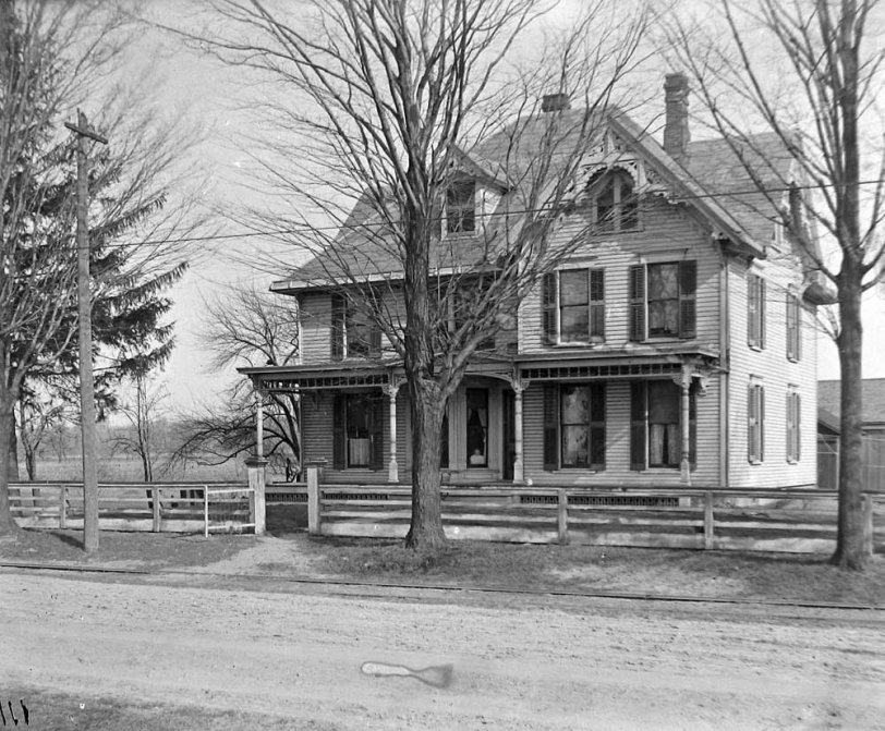 The Gilbert house on Mentor Avenue, Mentor, Ohio. Mentor Ave. is now U.S. Rte 20 and no longer dirt. The interurban trolley is long gone. Glass plate negative by B H Carpenter, c. 1914. View full size.
