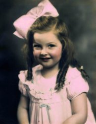 This is a scan of a photo of my Mom - Gloria Sinn.  The colorization is the original.  I'm guessing this was taken in 1936.  I remember seeing this photo for years in my grandparents house on Afton Street in Northeast Philadelphia. View full size.
(ShorpyBlog, Member Gallery)