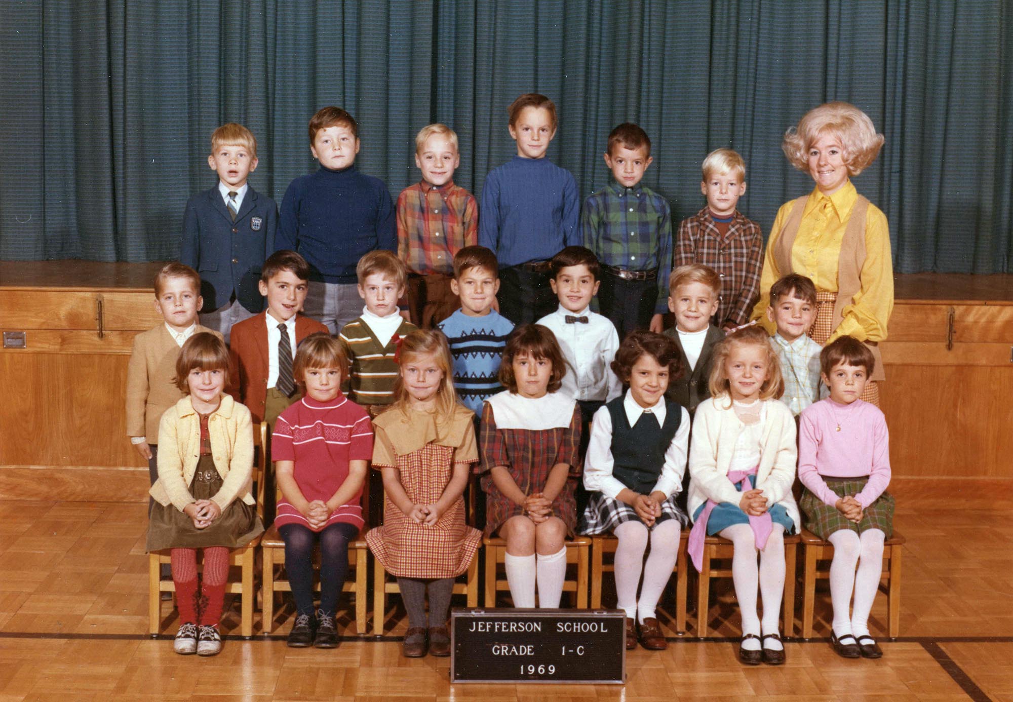 My first grade class picture at the Jefferson School, Succasunna, Roxbury Township, Morris County, NJ. I am in the back row, second over from the teacher. Check out her big hair.

To my knowledge, all of the schools in Roxbury Township, except for the high school, were named for presidents.