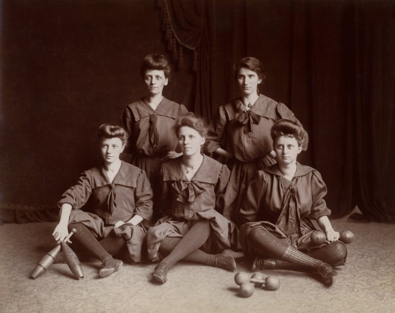"Grand Rapids YWCA" is written in pencil on the back of this print from Michigan. There is no date, but the Grand Rapids YWCA was opened in 1900. To my eye the outfits do not look much more recent than that. View full size.
