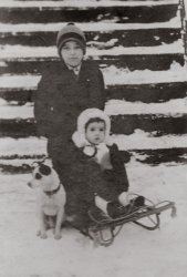 This is my grandfather, his sister Eileen and their dog, Sport. The likely location is their home on Pacific Street in Brooklyn. It seems to have been taken around 1908, judging from their ages at the time. View full size.
(ShorpyBlog, Member Gallery)