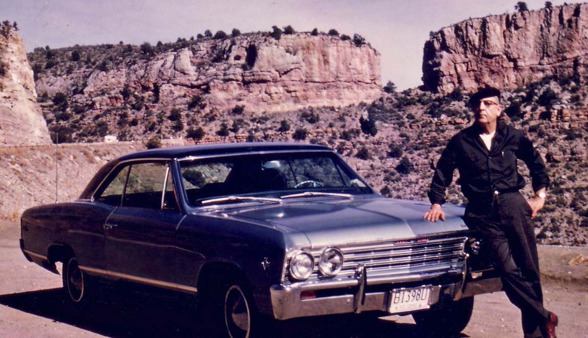 My Grandpa was a master mechanic and he was proud of his new carm a  67 Chevelle, two tone blue, 327 4 barrel. First time out in the southwest and she's running mighty fine. View full size.