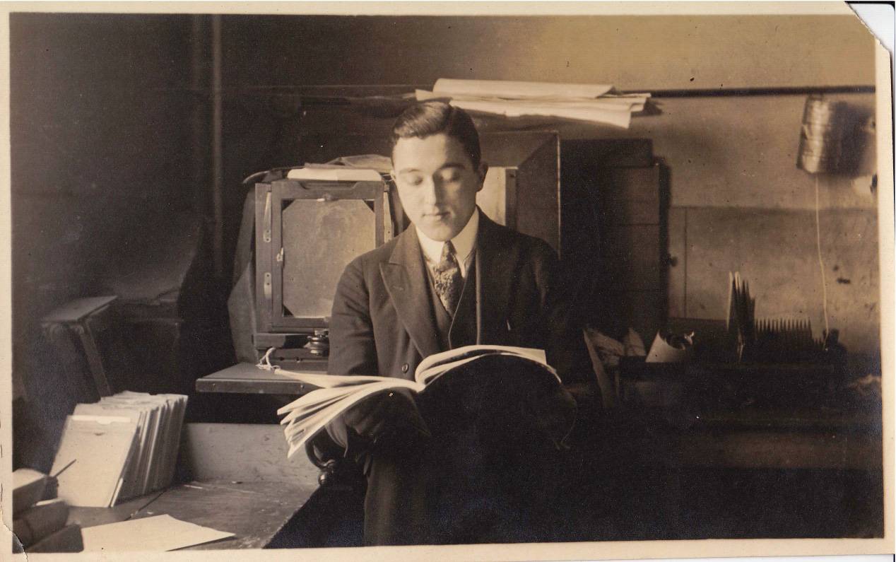 My grandfather leafing through a trade publication in his office at Vitagraph Studios in Brooklyn, c. 1920. View full size.