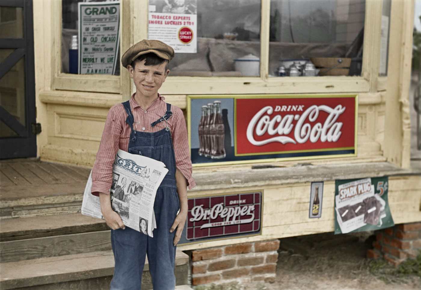 May 1938. Farm boy who sells "Grit." Irwinville Farms, Georgia. View full size.