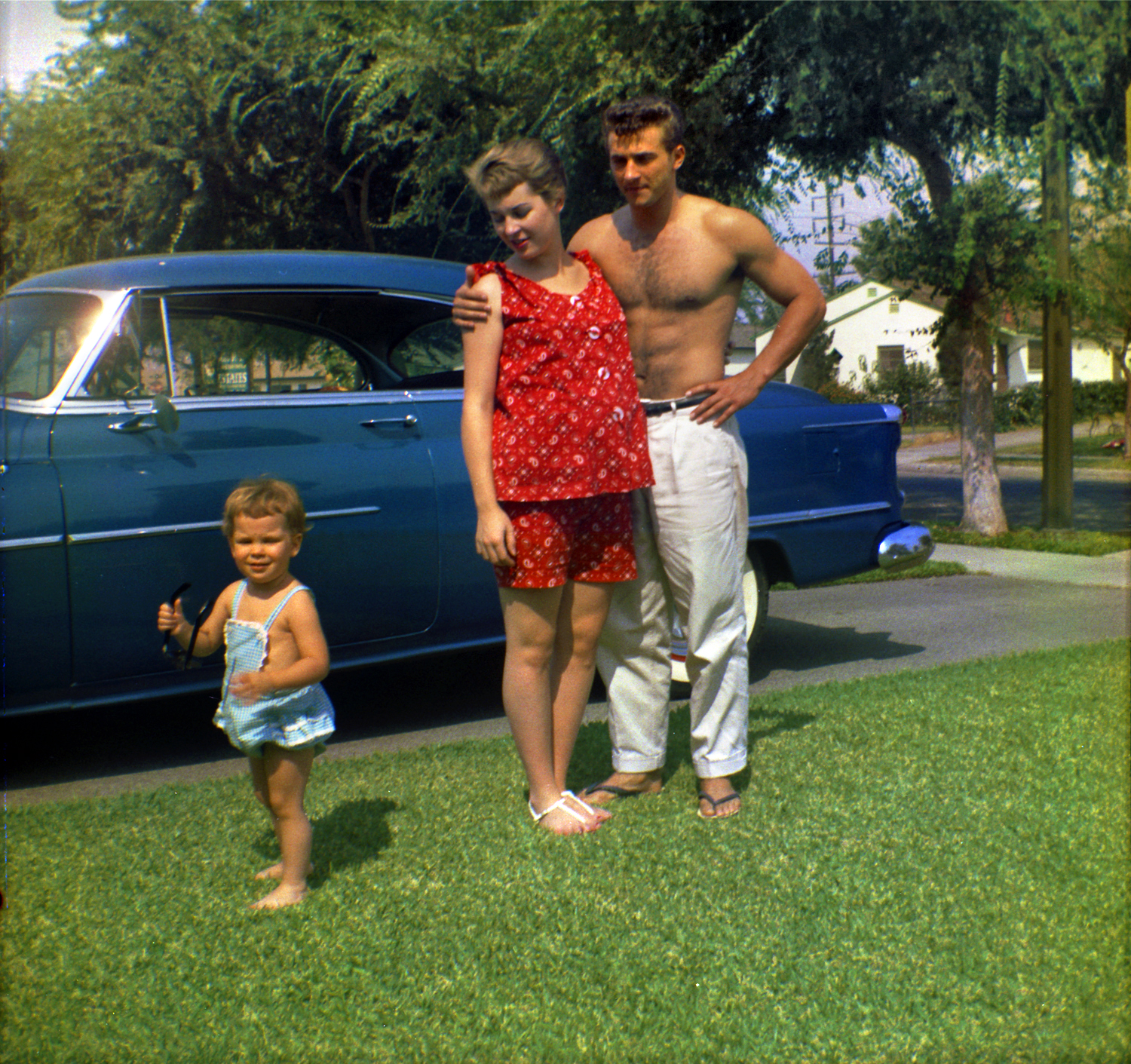 This was taken in East L.A. in 1960. That's my aunt on the left; my grandma, who is pregnant with my dad, in the middle; and Grandpa on the right. View full size.