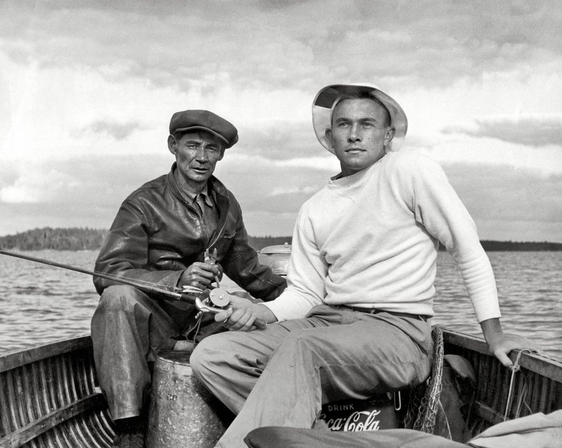 My father and his guide on the way to their fishing hole on the Lake of the Woods in Ontario. Taken by my grandfather with a 4x5 Speed Graphic around 1952. View full size.
