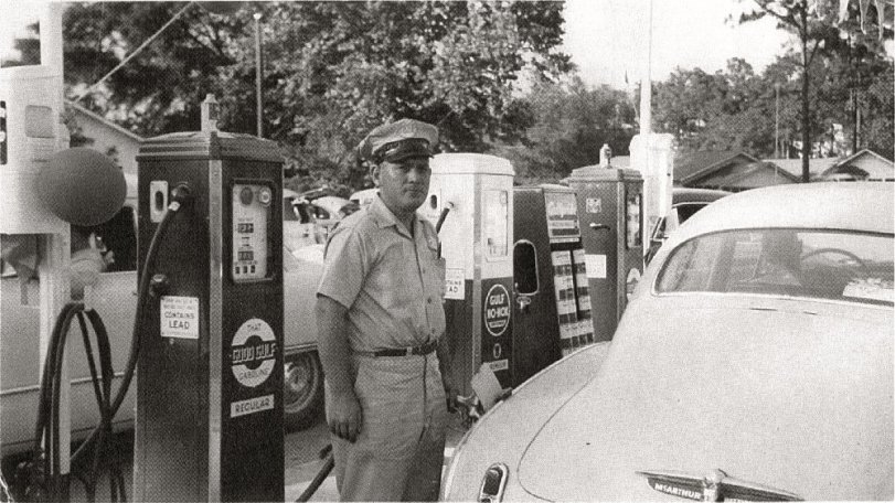 My father at the grand opening of his Gulf Gas station in Gulfport, Miss., circa 1955. You will notice that as a former U.S. Marine he has the thumb and forefinger of his right hand properly along the seam of his right trouser leg. View full size.
