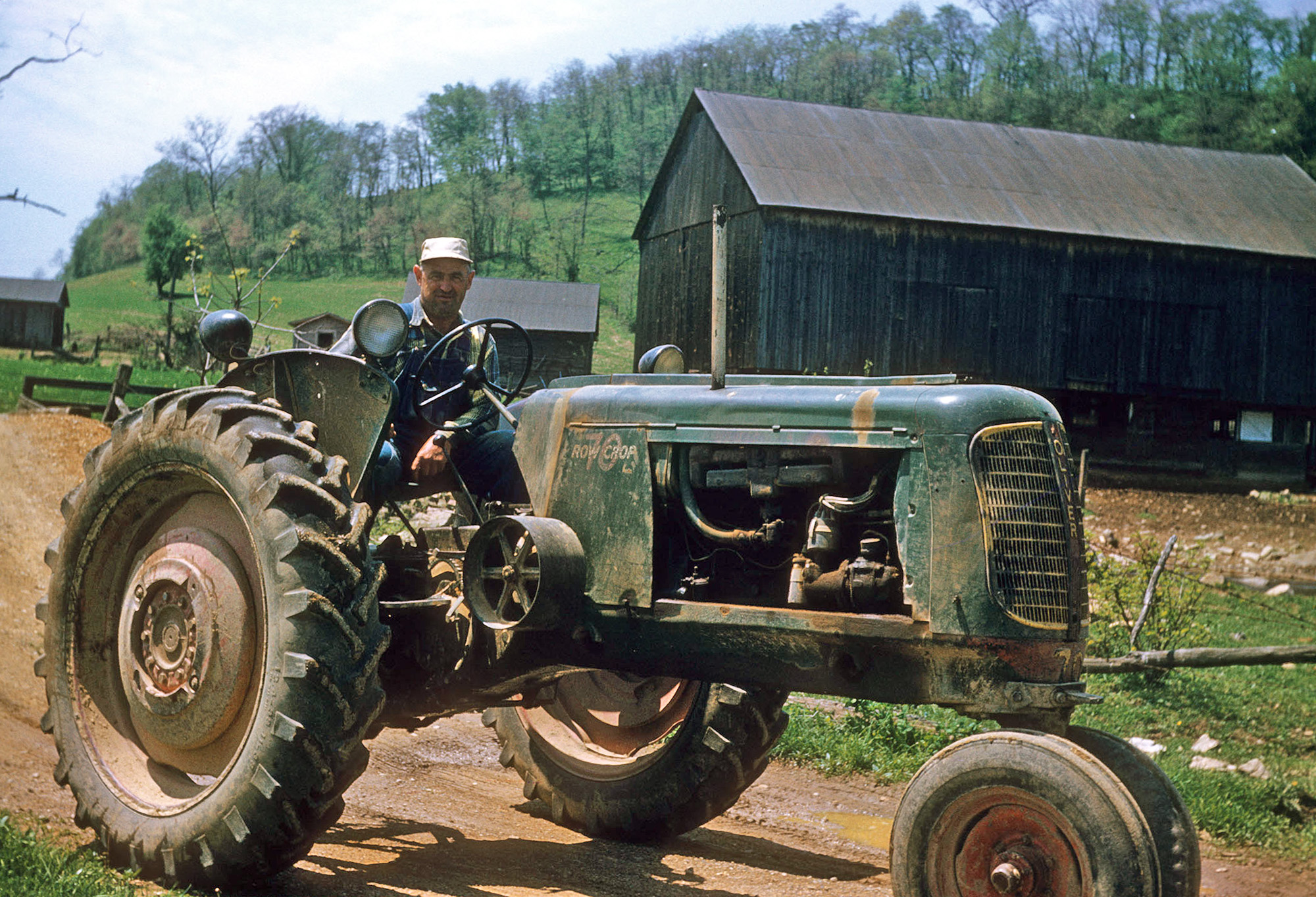 A farmer known to my family (but, sadly, not to me) smiles at the photographer - presumably my grandfather - in this early-1950s shot from Honey Grove, Pennsylvania. View full size.