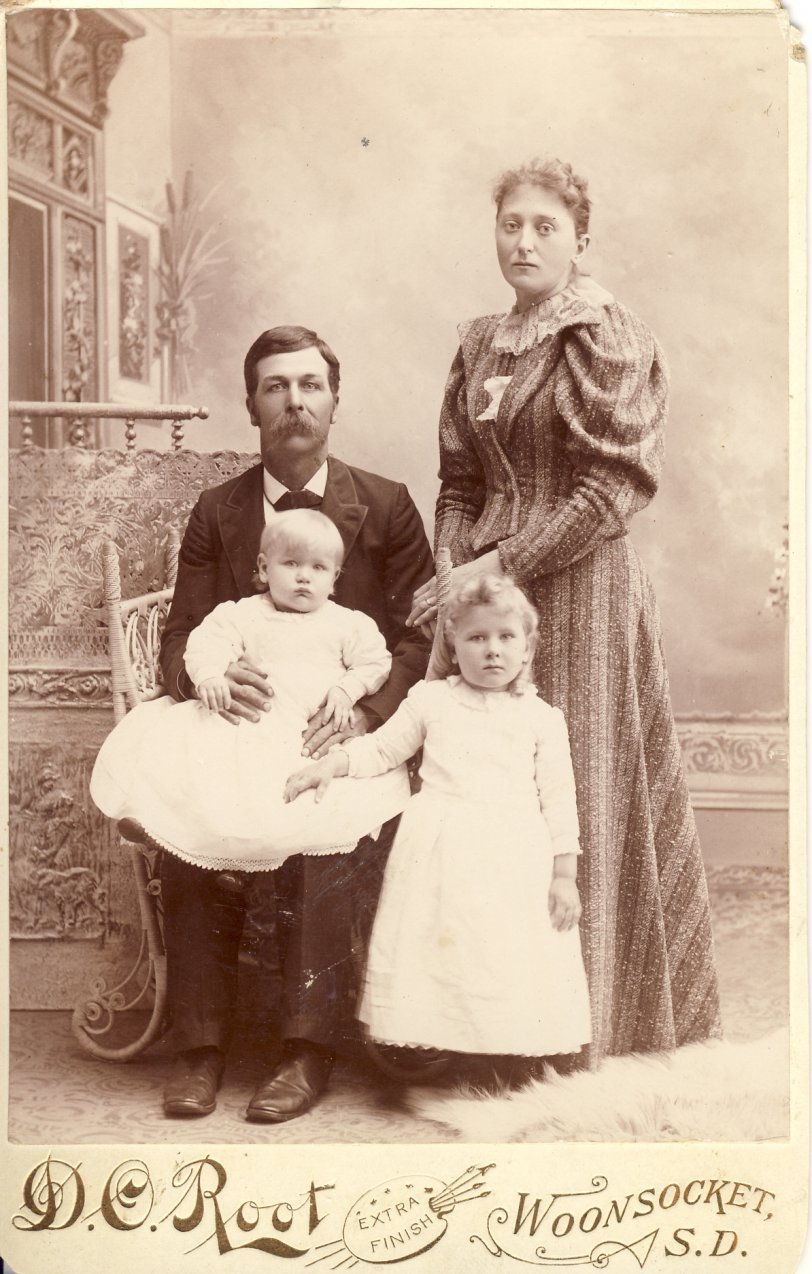 This is a portrait of my great, great grandparents D.P. &amp; Sarah Hollingsworth with their children Hester (standing on the right) and Richard (on the lap). Richard is my great grandfather. View full size.
