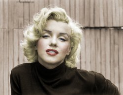 Hollywood, 1953. "Actress Marilyn Monroe, playfully elegant at home." 35mm negative by Alfred Eisenstaedt, Life photo archive. View full size.
(Colorized Photos)