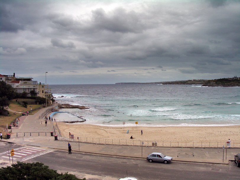 Here's Mr Mel's digital photo of Bondi Beach, January 17, 2005. Taken with a Pentax Optio S5i, on not the nicest day. View full size.
