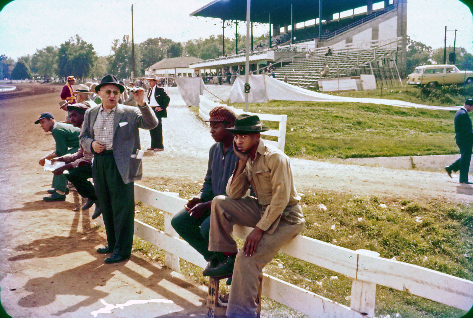 Everyone in this picture is looking to make some money today.  Taken by my grandfather in the mid-1950s at Keeneland Racetrack in Lexington, Kentucky. View full size.