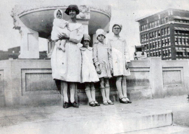Paris, Texas on the square 1928. My Great Grandmother Sara Puckett and her children Leona (My Grandmother, she's the one with glasses), Dora, Bobby, and Bill (baby). View full size.
