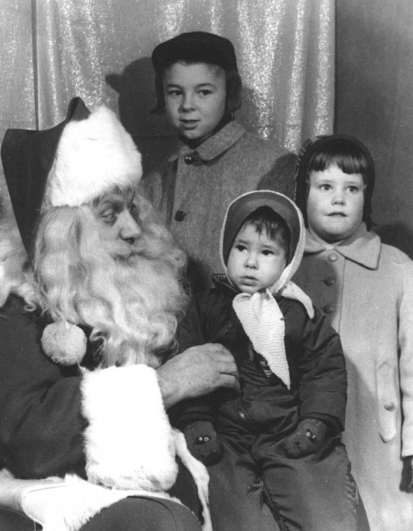 Even though my cousin Kathy gave this photo the title "Immigrant children meet Santa for the first time," we were not immigrants, even though it looks like we had just escaped war-torn Warsaw. And we had met Santa many times, despite brother Billy's concerned expression. Taken in 1959 at the Ford Rotunda, Detroit, MI. View full size.
