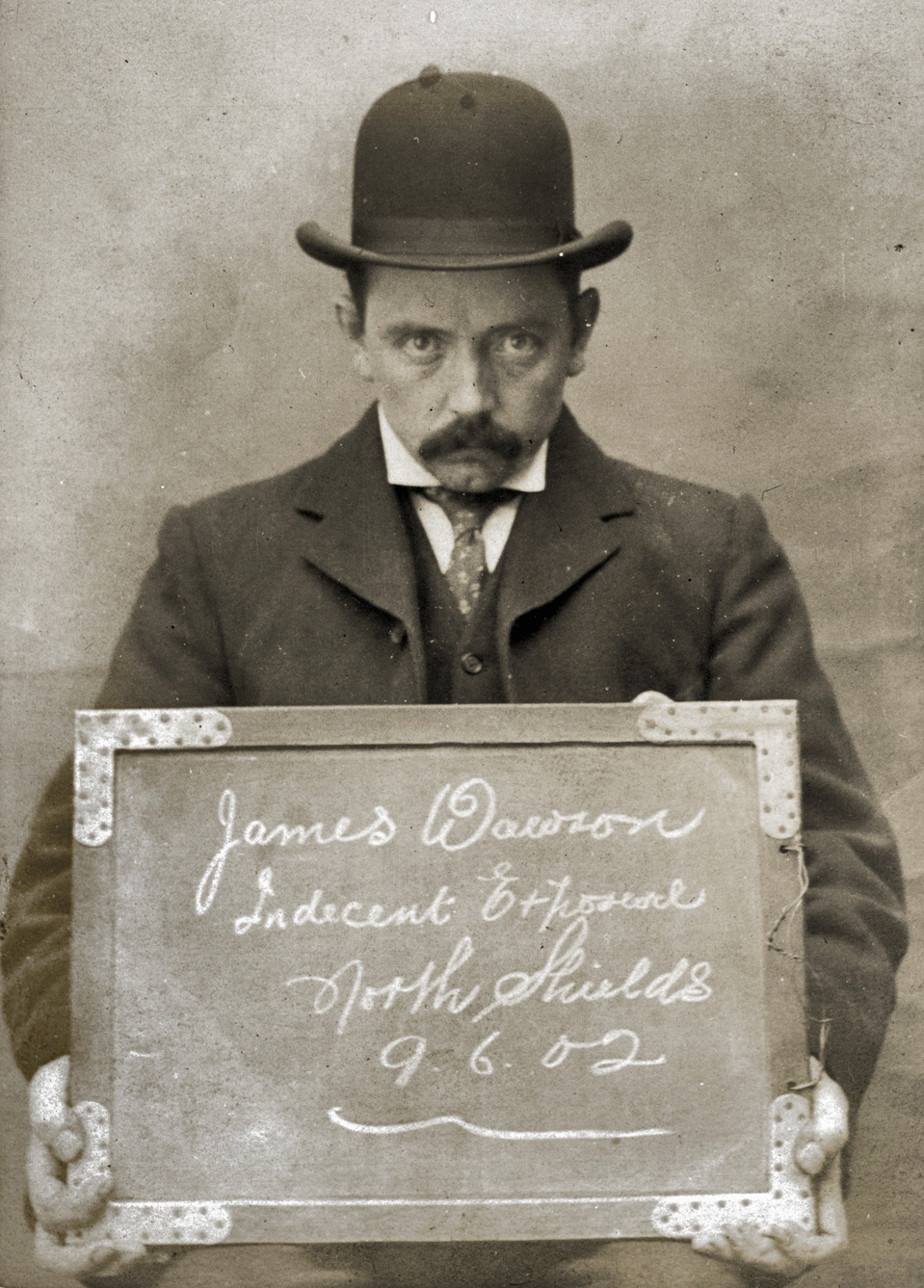 "James Dawson, arrested for Indecent Exposure. North Shields Police Station, 9th June 1902." Our first image from a photograph album of prisoners brought before the North Shields Police Court in England between 1902 and 1916, now in the collection of the Tyne & Wear Archives and Museums. View full size.
