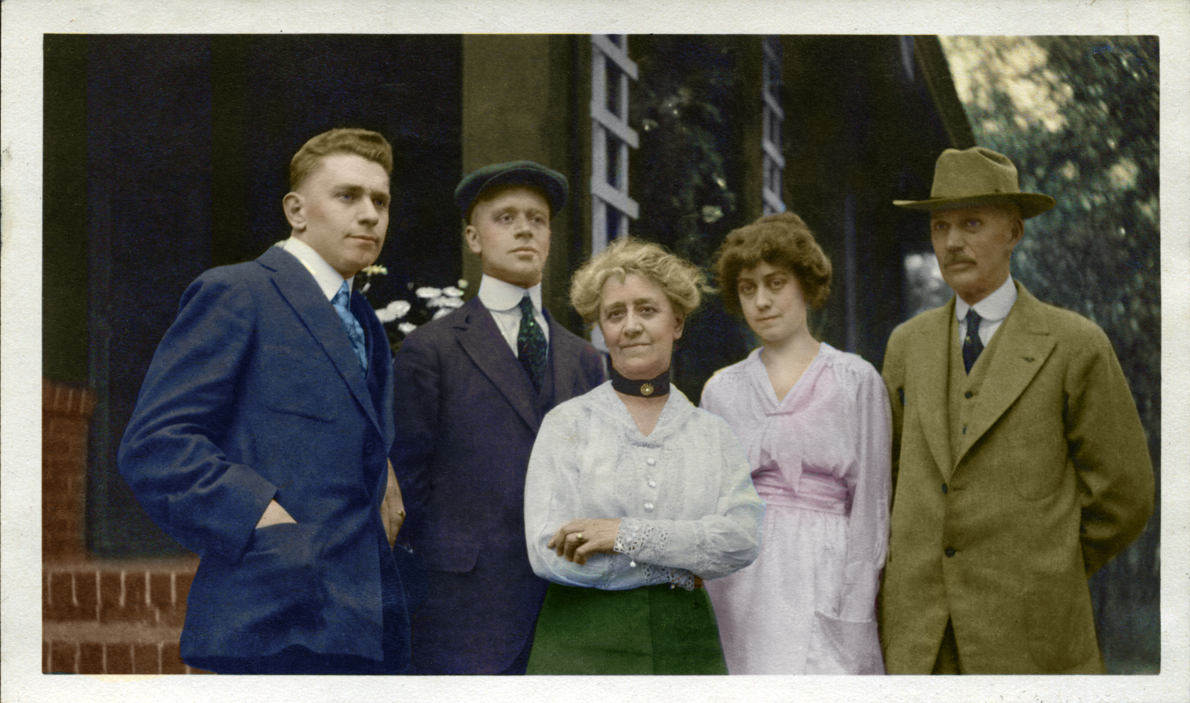 The C.W. Jenne Family, 1919, Elgin, IL. Colorized from a black and white image. From Left to Right: Donald Dickinson Jenne (Grandpa), Paul Jenne, Agnes, Marguerite, CW (Charles William). View full size.
