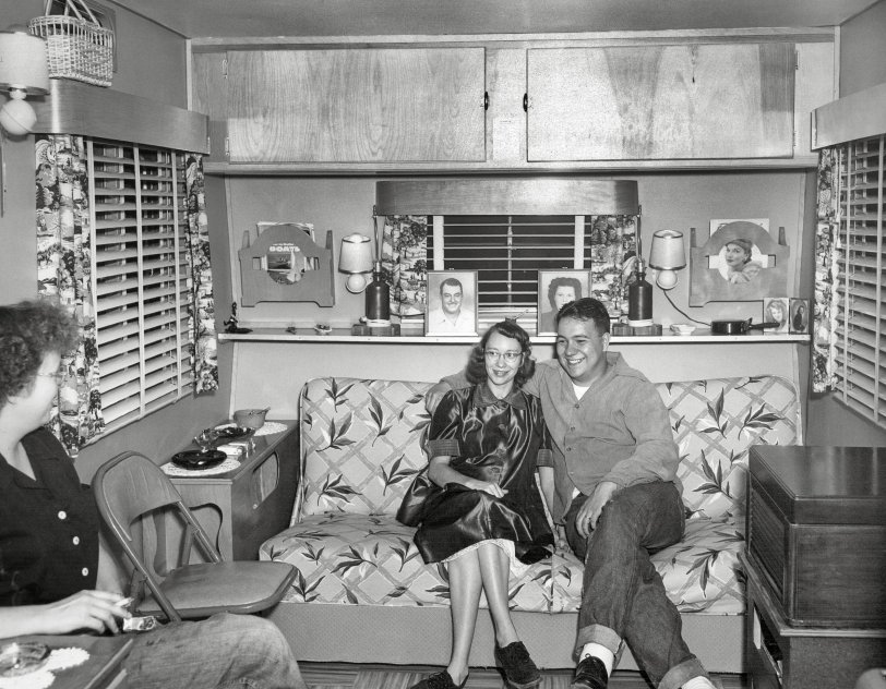 My good friend and former neighbor Jim and his wife Lois in their trailer home in the early 1950s, when he was stationed in Florida as a radioman in the Navy. He loved motorcycles, hot rods, music, cats, exotic birds, and most of all people. Talking to him was guaranteed to make you smile. Godspeed Jim! View full size.
