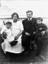 My dad Tony, his younger brother Joe and my grandparents Catherine and Louis. My grandmother was expecting my Uncle Mario at this time.  She had 6 boys in 10 years.  This was taken in the coal mining town of Lake Trade, Pa.
(ShorpyBlog, Member Gallery)