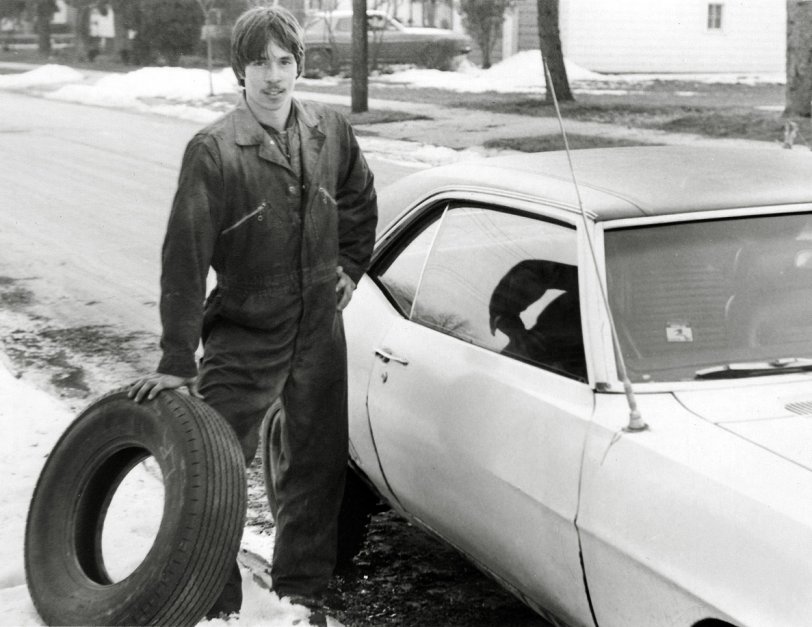 I used to help my Grandpa work on cars in his garage for extra money.  I was about 17 here and just got home, all greasy and stuff. View full size.
