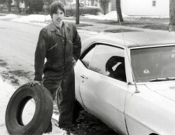 I used to help my Grandpa work on cars in his garage for extra money.  I was about 17 here and just got home, all greasy and stuff. View full size.
(ShorpyBlog, Member Gallery)