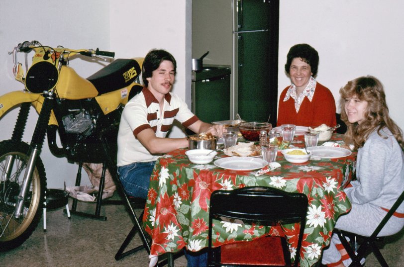 1979. Got my own place at age 21 in Dallas, Texas. My fam came down from Ohio to check it out. The dining room doubled as my garage. View full size.
