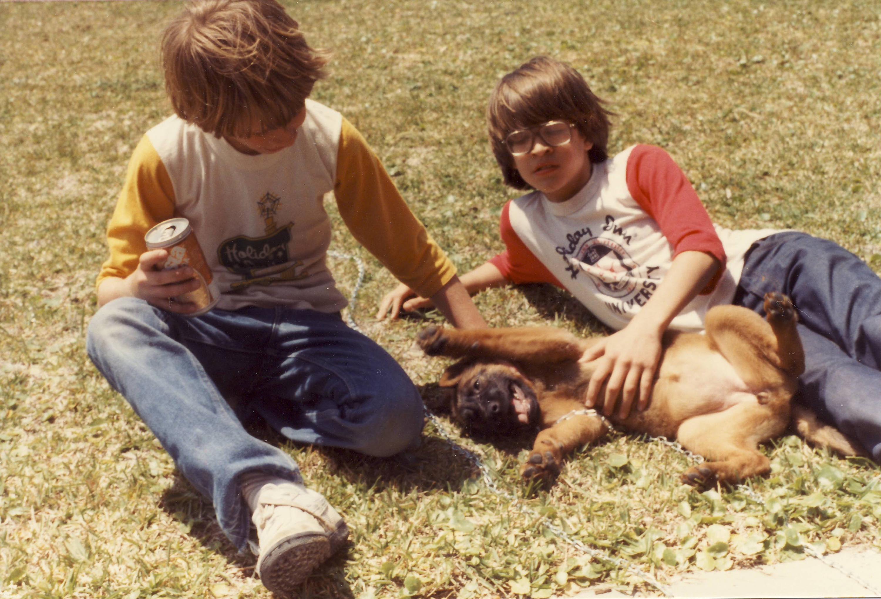 My photo from 1983 from an employee picnic in Houston. These are my two sons enjoying the day with their new pup Chu-e.