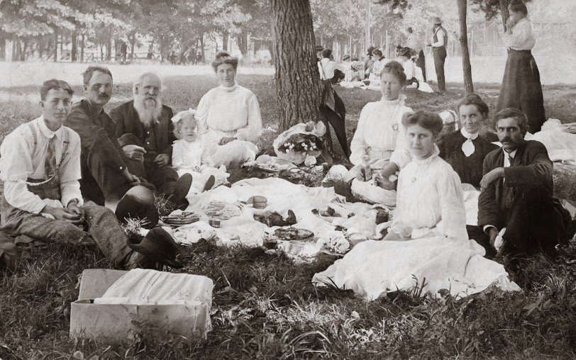 Shaddox Family Picnic. c. 1905. The photo was probably taken in La Rue, Arkansas, in a park that is now under water due to the building of the Beaver Dam in the 1960s. Some of those in the photo: William Marion Hale (grandson of William Elijah Shaddox, Sol Shaddox, William Elijah Shaddox (older gentleman), Minnie Belle and Bertie Pearl Shaddox (daughters of Sol) Georgia Ann Rogers, toddler is Gladys Mae Shaddox. View full size.
