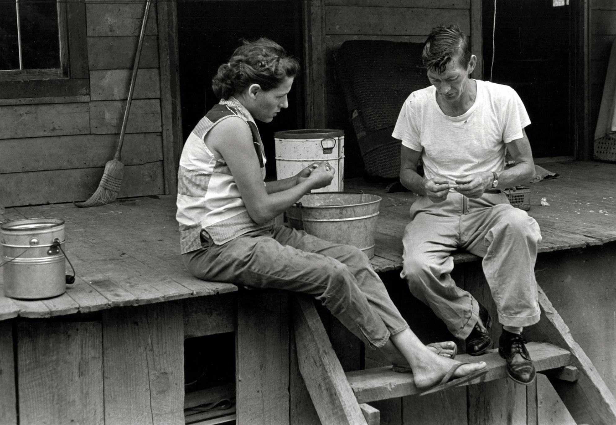 "Leatherwood, Kentucky, 1964. Willie and Vivian Cornett sitting on porch." Willie, a recently laid off coal miner, and wife Vivian had 12 children when William Gedney snapped this exposure on his first visit with the Cornett family. Gedney Photographs and Writings Collection, Duke University.  View full size.