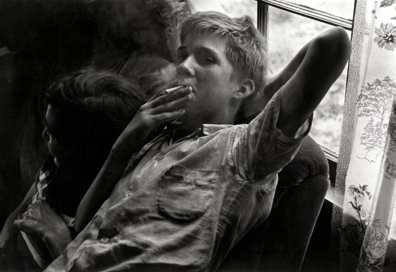 "Cornett family, 1964. Teenage boy smoking." An image from photographer William Gedney's first visit with the Cornett family in Leatherwood, Kentucky. Gedney Photographs and Writings Collection, Duke University.  View full size.
