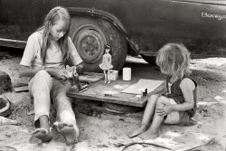 "Cornett family, Kentucky, 1972. Girls playing with Barbie dolls next to parked car." More members of the Cornett clan and its fleet of vehicles. William Gedney Photographs and Writings Collection, Duke University.  View full size.