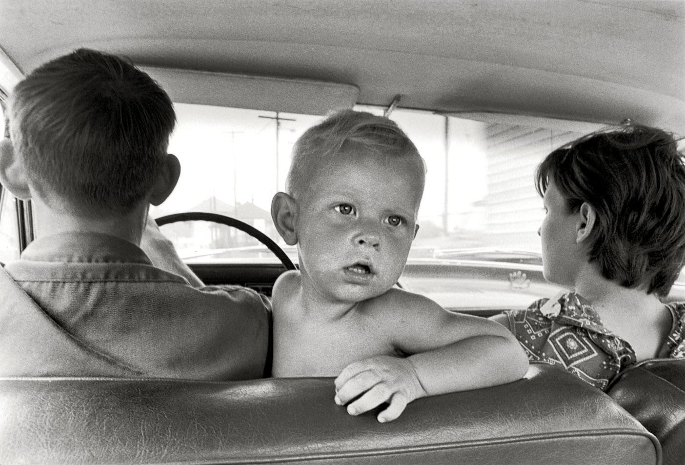 "Cornett family, Kentucky, 1972. Family in car, baby looking back." Our daily dose of the Cornetts and their cars. Print from 35mm negative by William Gedney. Gedney Photographs and Writings Collection, Duke University.  View full size.